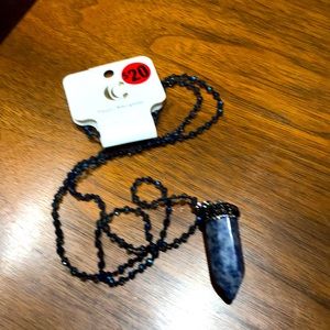 Long crystal necklace.